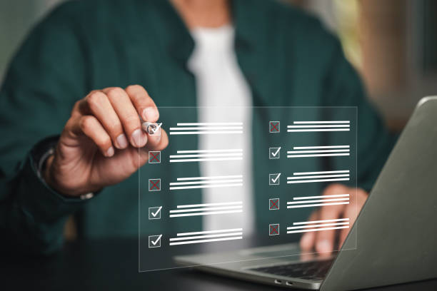 istock Businessman tick correct sign mark for document approve, project acceptance and quality assurance concept,evaluation, online survey, online exam, checklist. 1484140021