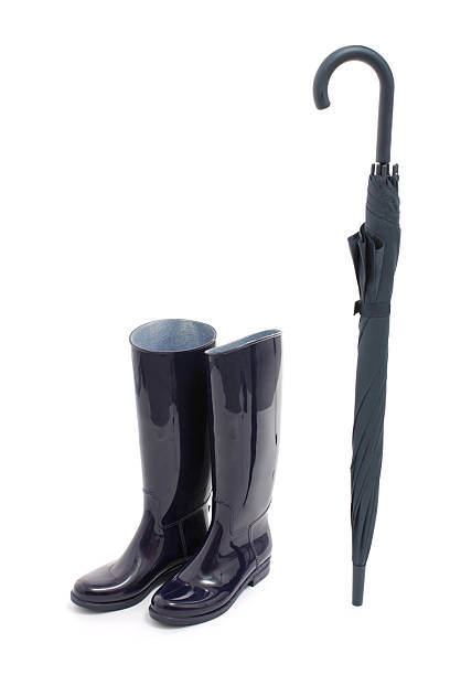 istock Womens Wellingtons and Umbrella 148414317