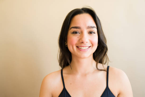 istock Smiling attractive young woman looking happy 1484145915