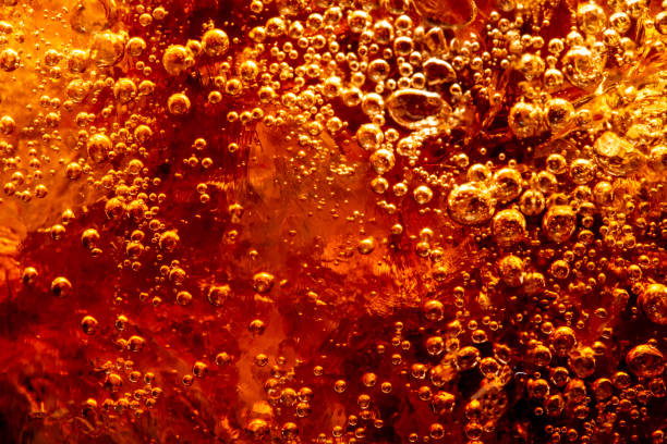 istock macro cola background,Background of cola with ice and bubbles. Side view background of refreshing cola flavored soda with carbonated with vintage tone,Thailand, Turkey - Middle East, Cola, Soda, Bubble 1484149022