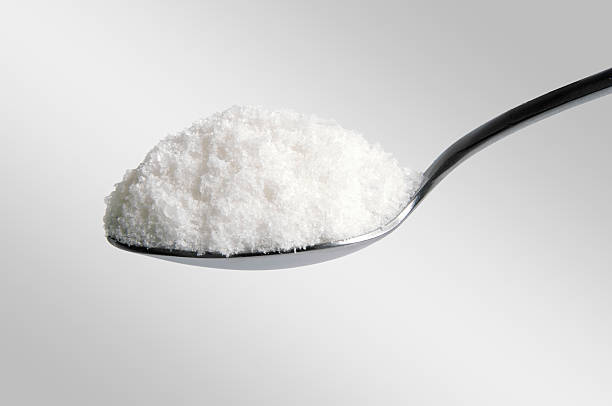 istock salt in the spoon on white 148415229