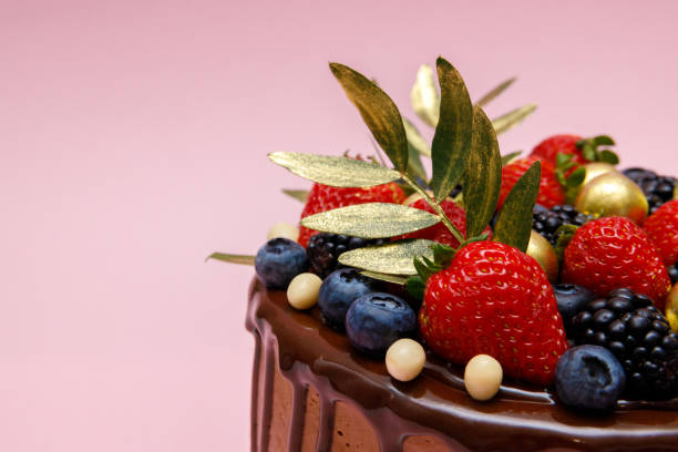 istock Chocolate cake in chocolate glaze with strawberries 1484153869