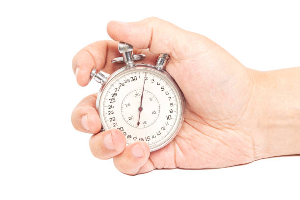 istock stopwatch in hand isolated on white background. 1484154993