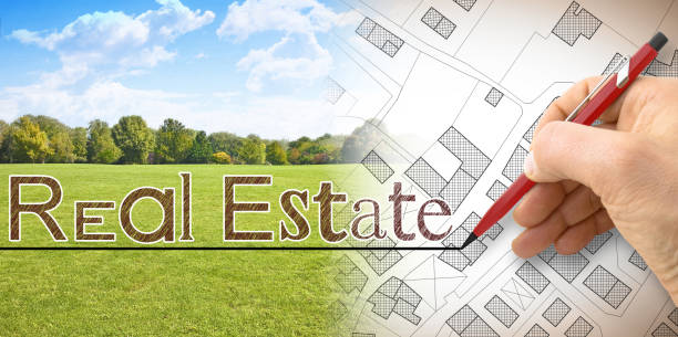istock Real Estate and Land plot management concept with hand drawing over an imaginary cadastral map of territory with buildings, roads and a green field available for building construction 1484156460