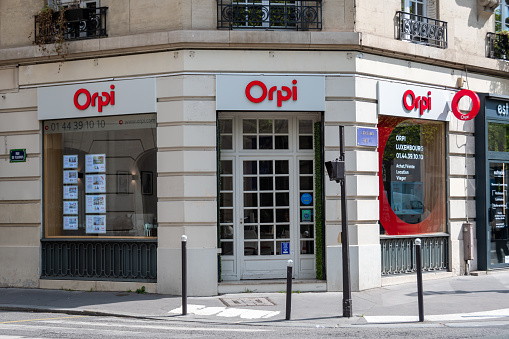 Paris, France - April 21, 2023: Exterior view of a real estate agency Orpi (Regional Organization of Real Estate Professionals), France's leading network of real estate agents