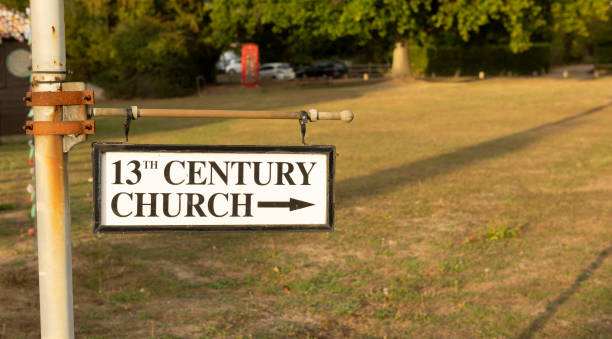 istock 13th century church sign afternoon light 1484161623