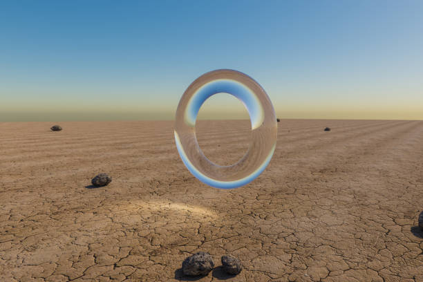 istock single glas ring hovering in the air in large empty desert environment; abstract surreal concept; 3D Illustration 1484164128