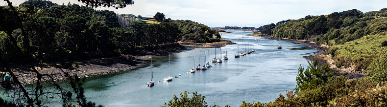 small sailboats in a bay, river mouth of Brittany
