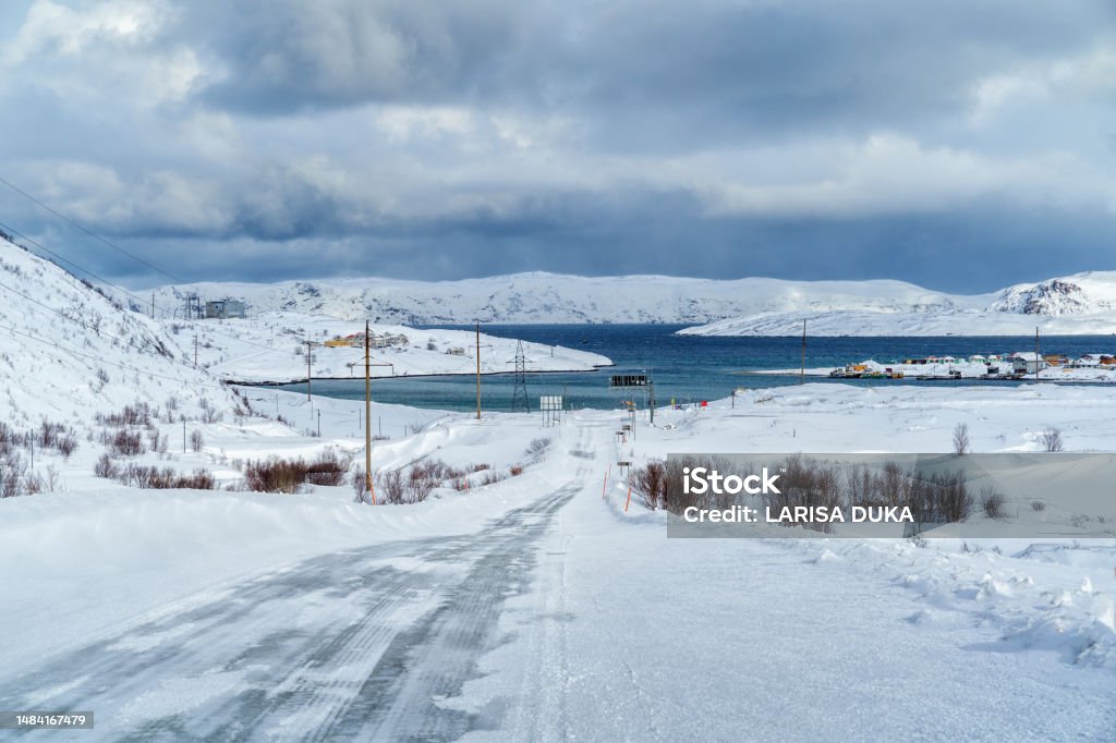 View of the village of Teriberka in the Murmansk region in Russia, on the coast of the Barents Sea View of the village of Teriberka in the Murmansk region in Russia, on the coast of the Barents Sea. Arctic Stock Photo
