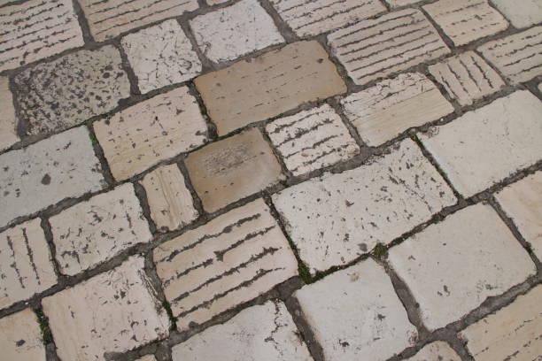 istock paving stones on the street 1484174360