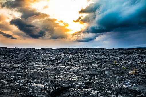 Volcanic Rock Landscape Epic Clouds at Golden Hour Alien Planet in Hawaii Contrast Moody. Clouds at War.