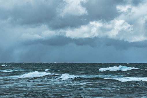 View of stormy ocean water fronts with waves