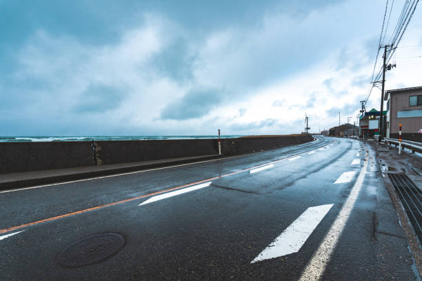 Coastline road storm weather rain empty road