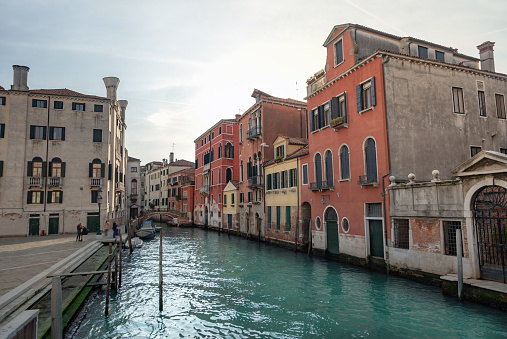 Venice canal view with historical buildings.