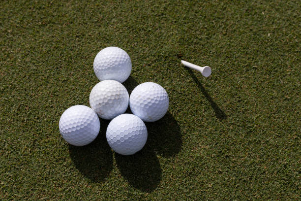 istock Close up of golf balls and tee 1484180333