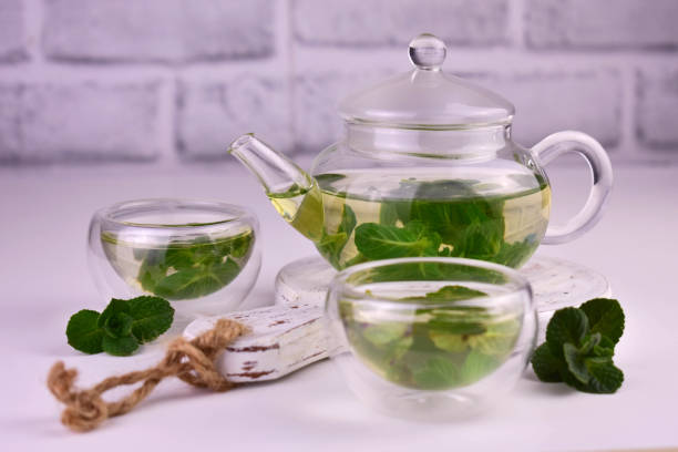 istock Mint tea with fresh mint leaves in a glass teapot. 1484181974