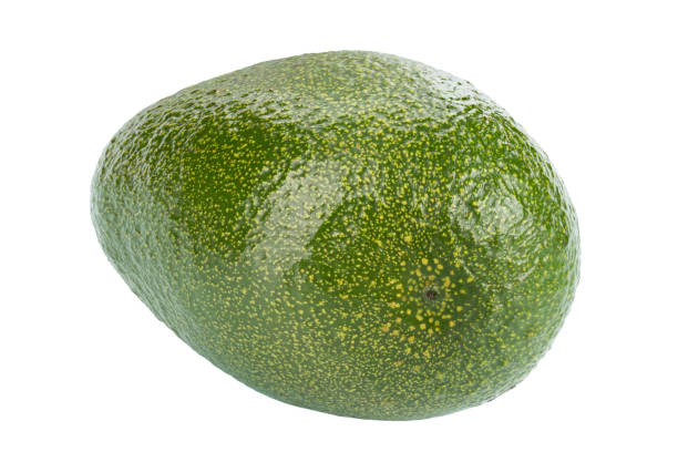 спелый цельный авокадо изолирован на белом фоне. файл содержит обтравочный контур - avocado portion brown apple core стоковые фото и изображения
