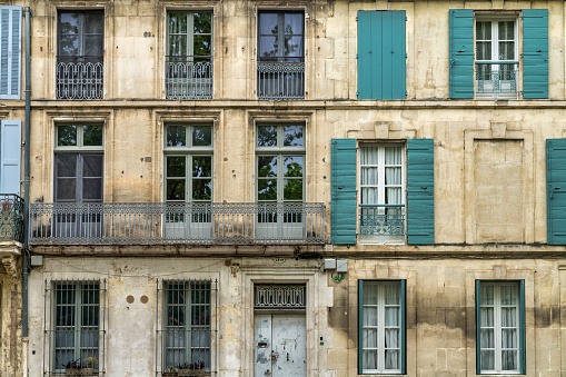 This photo showcases the exquisite architecture of a Renaissance-style building in Arles, France. The image captures the intricate details of the building's facade, including the elegant arches, ornate carvings, and decorative moldings. This photograph is perfect for use in architecture and travel publications, highlighting the beauty and cultural significance of Renaissance-style buildings. It can also be used as a decorative piece, adding a touch of sophistication and elegance to any interior design project.