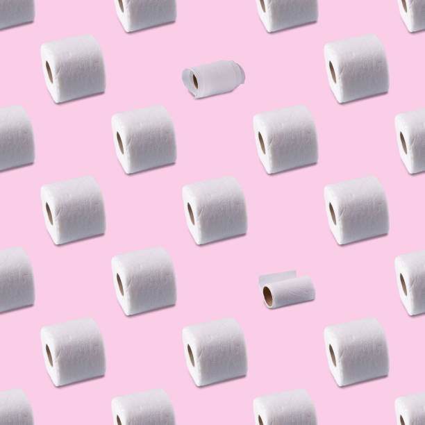 istock rolls of white toilet paper on a pink background, seamless pattern 1484199252
