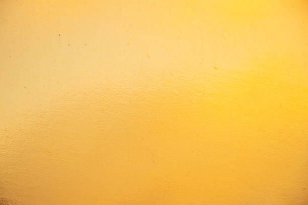 istock golden wall as a background close up 1484205011