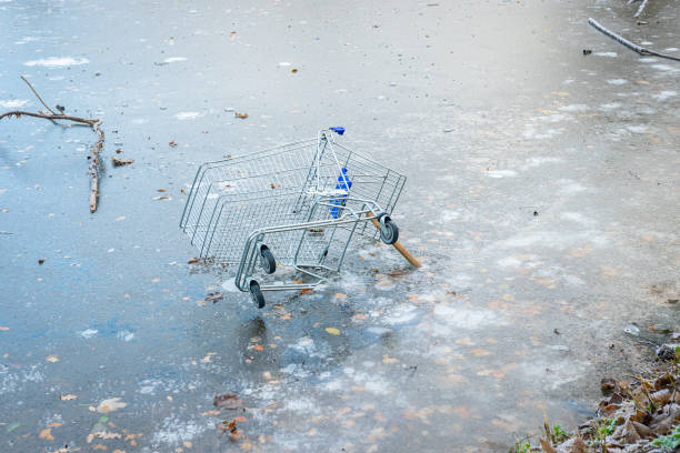 istock Shopping cart is stuck in ice 1484207297