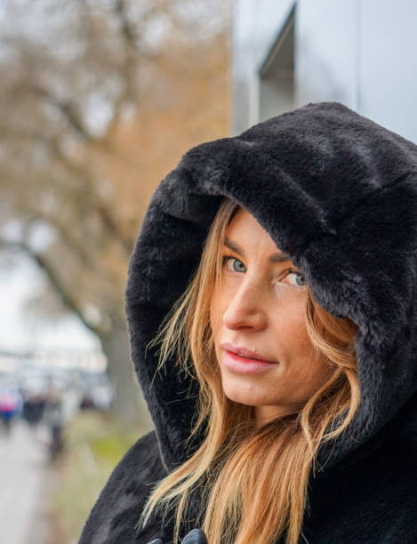 istock Woman in warm clothing outdoors during autumn 1484210149