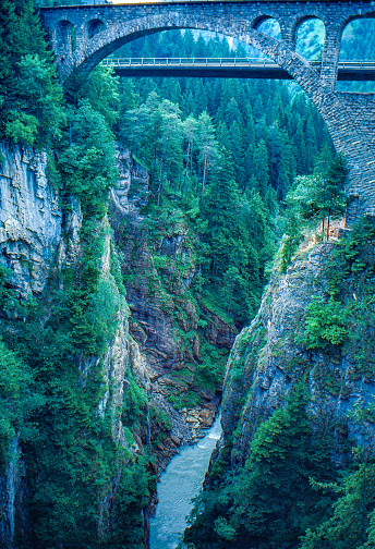 1989 old Positive Film scanned, the view of the viaduct across a deep ravine in the Swiss, Albula/Alvra, Switzerland.