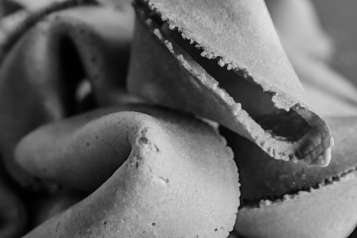 Black and White of Crispy Sharp Edges of Fortune Cookie close up
