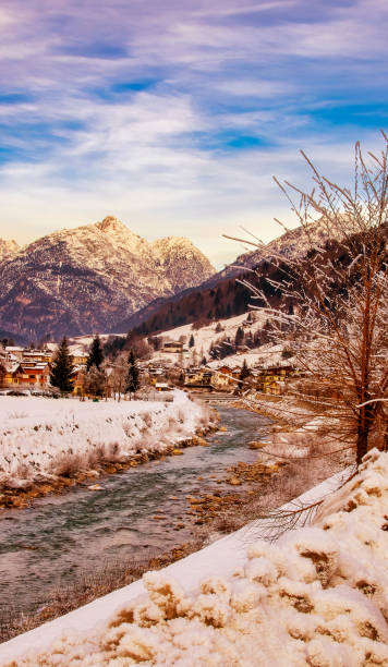 istock River surrounded by snow and forest on a sunny winter day 1484213458