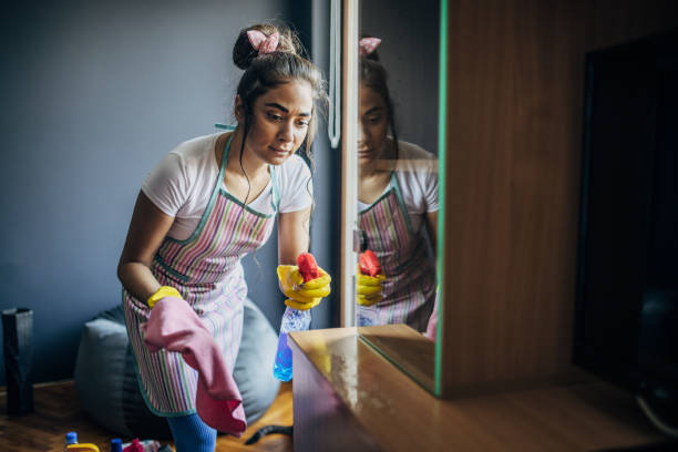 istock A young cleaning woman 1484225677