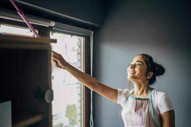 istock A young woman is cleaning 1484226357