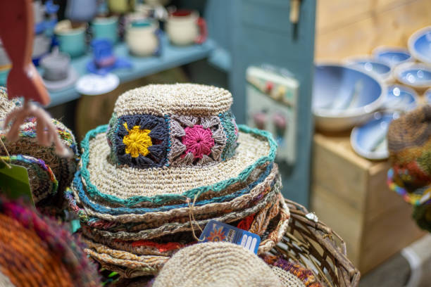Straw hats with colorful details at night.