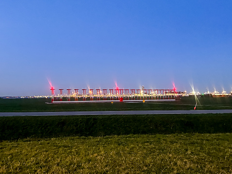 The lighting at the end of the runway at Schiphol airport in Amsterdam