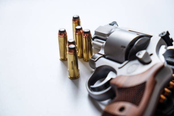 istock .44 magnum revolver gun with bullet on white background 1484243377