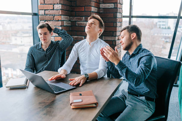 istock Three young office workers looking disappointed at their laptop screen after a project failure. 1484245113