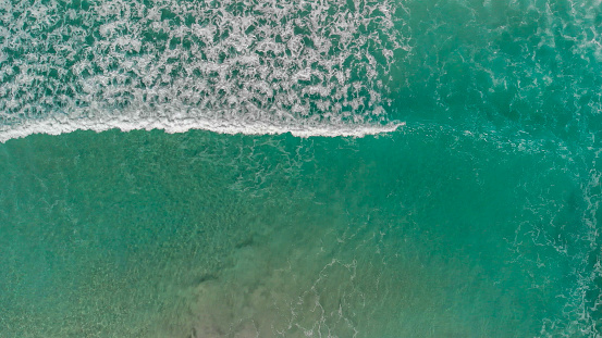 Beautiful waves along Pennington Bay, Kangaroo Island overhead aerial view.