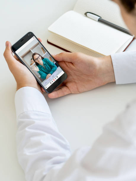 istock mobile conference business partners work on phone 1484245248