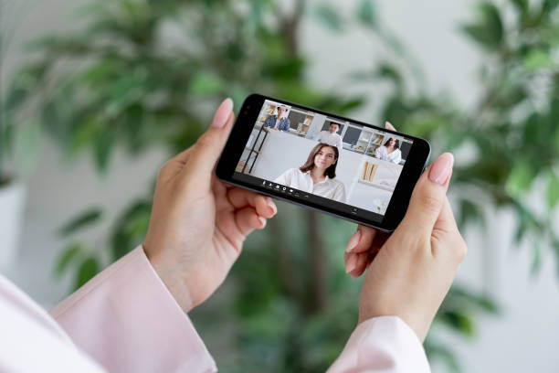 istock mobile conference business webinar group on phone 1484245266