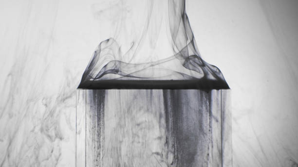 istock Steam floating ice cube ink water black smog white 1484245313