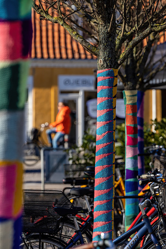 Copenhagen, Denmark March 31, 2023 Yarn bombing on trees and bicycles in the Valby district.
