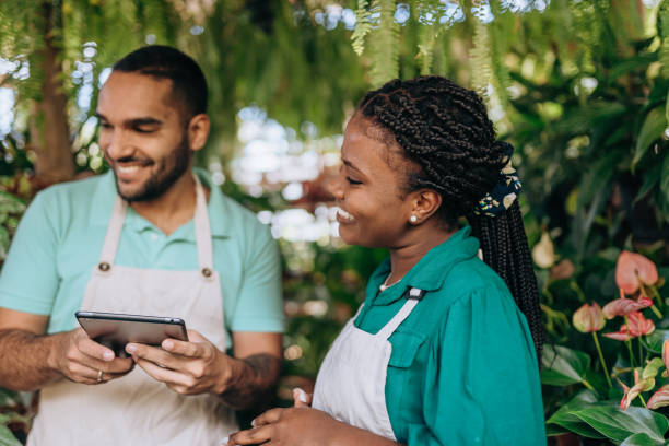 istock Partners at the plant shop working 1484252434