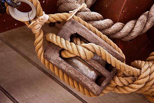 istock Hessian rope and wooden pulley 148425836