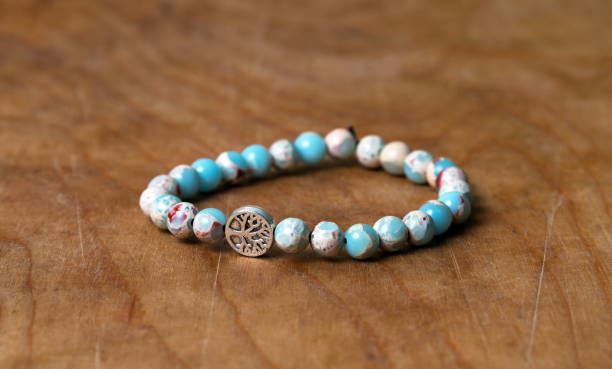 istock Bead bracelet on the wooden table 1484260527