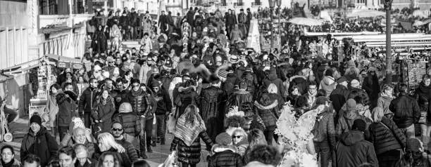 istock Crowd along major Venice streets on Mardi Gras carnival parade 1484262599