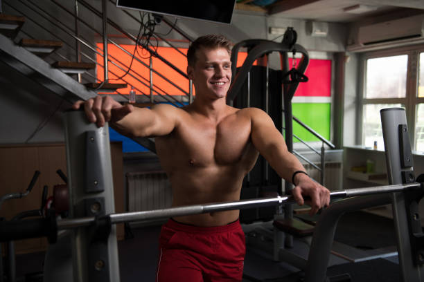 Handsome Good Looking And Attractive Young Man With Muscular Body Relaxing In Gym