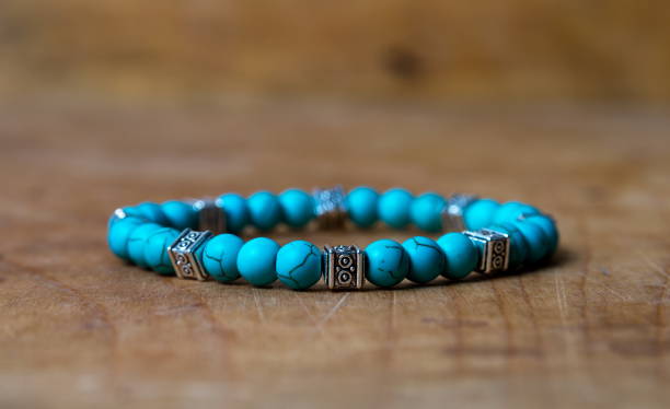istock Bead bracelet on the wooden table 1484263576