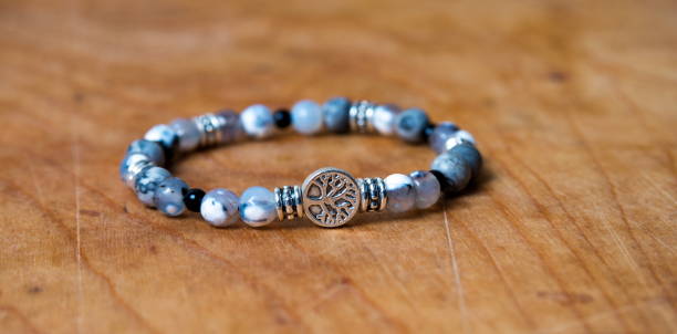 istock Bead bracelet on the wooden table 1484263641