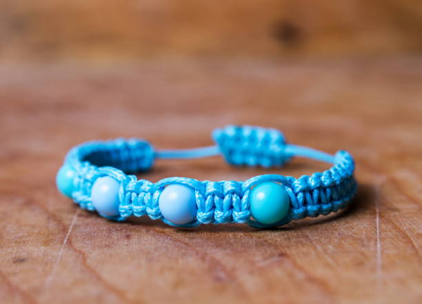 istock Bead bracelet on the wooden table 1484263703