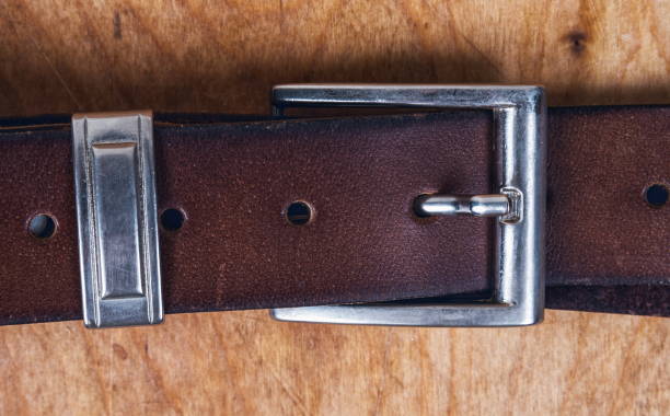 istock Male leather belt on the table 1484263841