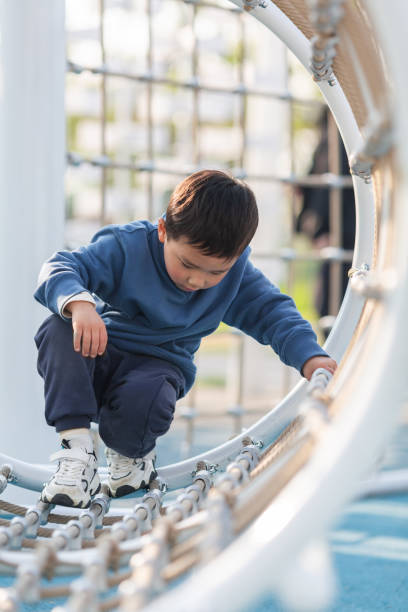 istock Asian boy playing outdoors 1484264614